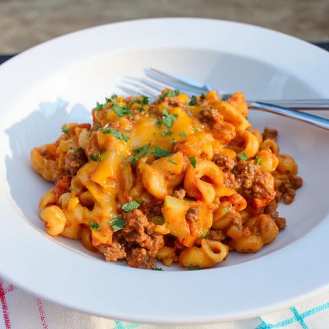 Close-up shot showing the creamy texture of Healthier One-Pot Hamburger Helper, ready to serve.