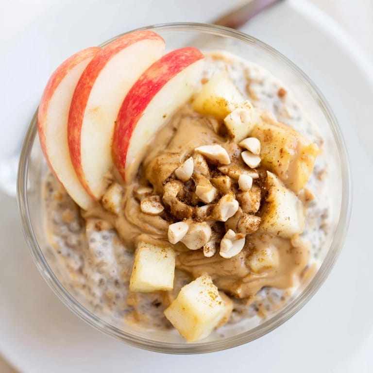 Healthy Apple-Chia Pudding is a layered parfait with peanut butter, perfect for a quick breakfast.